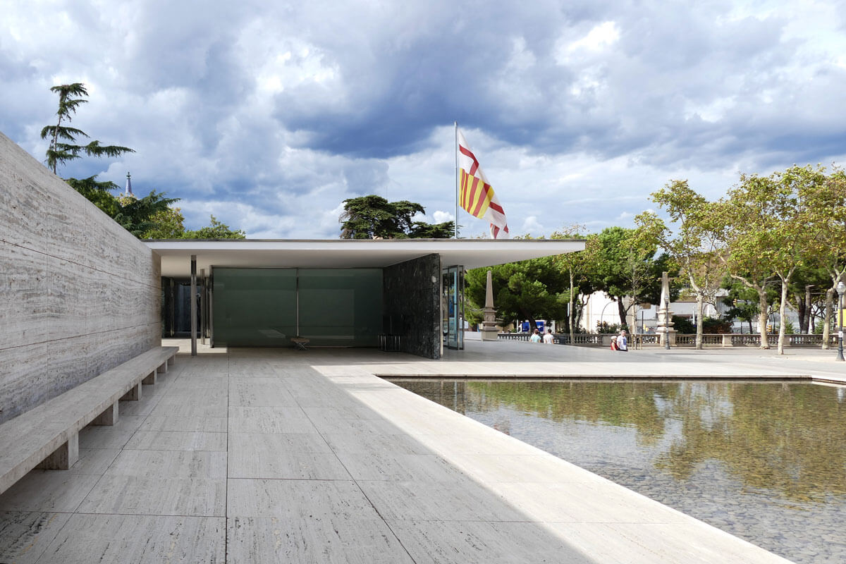 Floating roof plane of Barcelona pavilion, supported by chrome-clad, cruciform columns